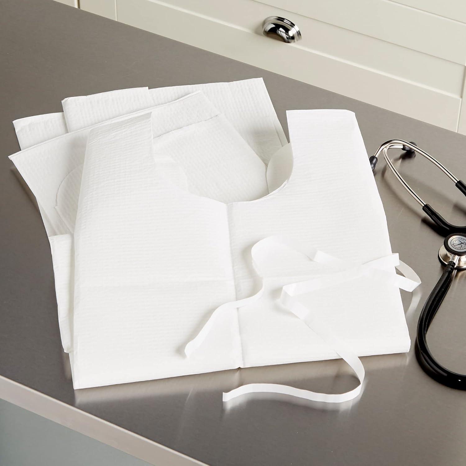 image:imageMcKesson Disposable Patient Exam Gown Pack of 50 LatexFree Medical Hospital TissuePolyester White One Size Fits Most