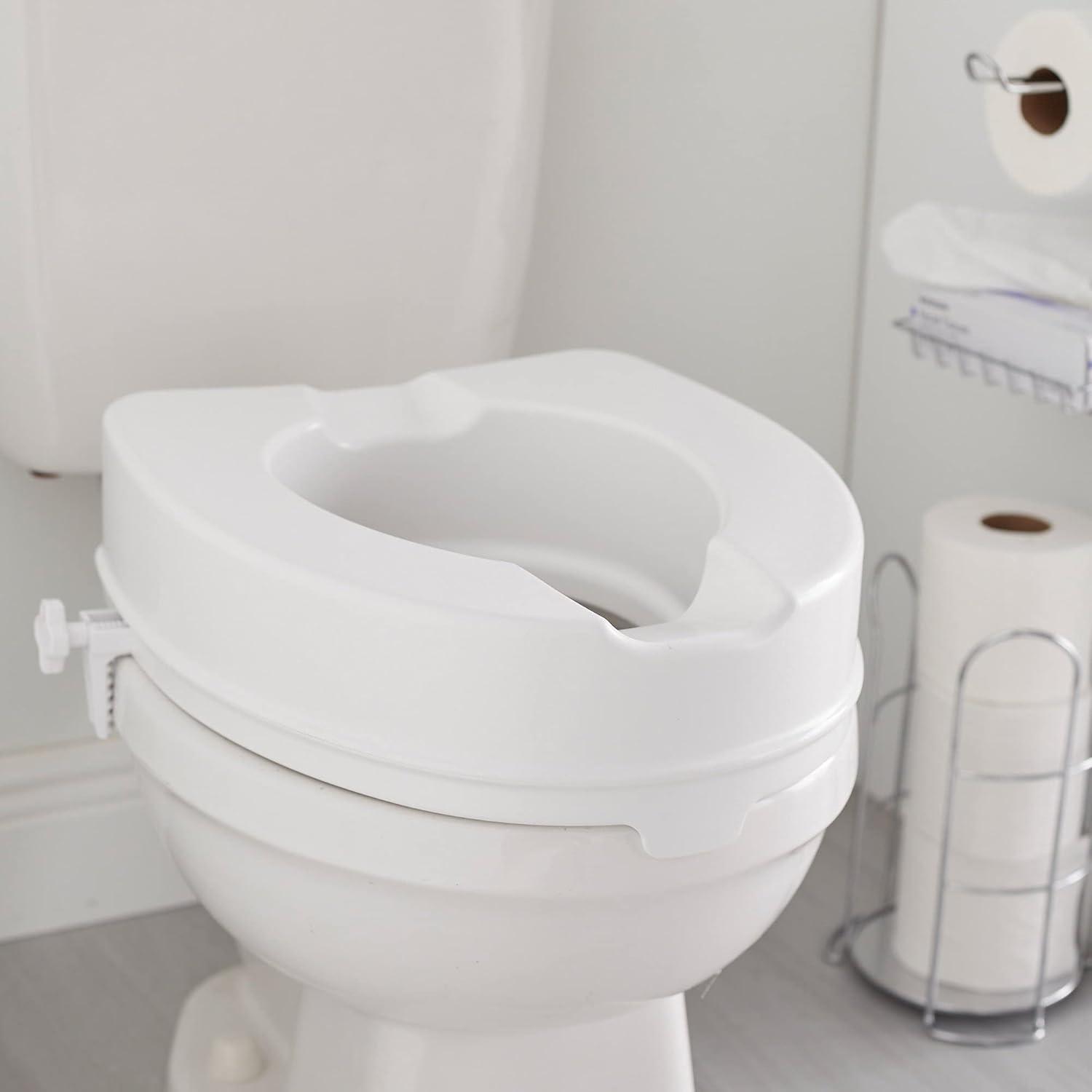 image:imageMcKesson Raised Toilet Seat with Dual Locks Fits Most Standard Toilets 4 in H 400 lbs Weight Capacity 1 Count